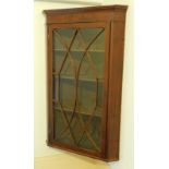 A 19thC mahogany hanging corner cupboard, with astragal glazed door, 103cm high.