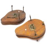 Two similar late 19thC mahogany and brass pear shaped tennis racket presses, each with an inset hand