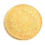 A French gold 20 franc coin dated 1856.