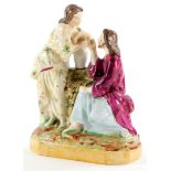 A 19thC Staffordshire figure group, depicting Jesus and Mary Magdalene, on canted rectangular base,
