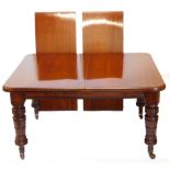 A late Victorian mahogany extending dining table, the rectangular top with a moulded edge above a pl