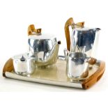 A teak and aluminium Picquot ware four piece tea service, with tray.