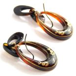 A pair of tortoiseshell drop earrings, each inset with gilt floral decoration, of three layer design