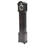 A 1920's grandmother clock in an oak case, the hood with spirally turned decoration, enclosing an ar