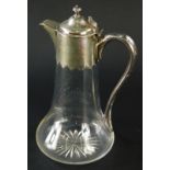 A Victorian presentation glass claret jug, with silver plated mounts, lid and handle, inscribed 'Pho