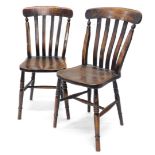 A pair of 19thC lath back ash and elm kitchen chairs.