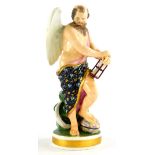 A 19thC Derby porcelain figure of 'Old Father Time', holding an hour glass, incised number 222 to th