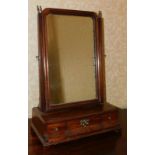 A George III mahogany dressing table mirror, with rectangular plate and three shaped frieze drawers,