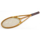 A Hazells Limited streamline vintage tennis racket, stamped Hazells White Star, patent 449362, 69cm