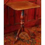 A Victorian mahogany tilt top table, with moulded square top, 44cm square.