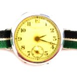 An early 20thC silver cased wristwatch, the small enamel dial with gilt decoration seconds dial and