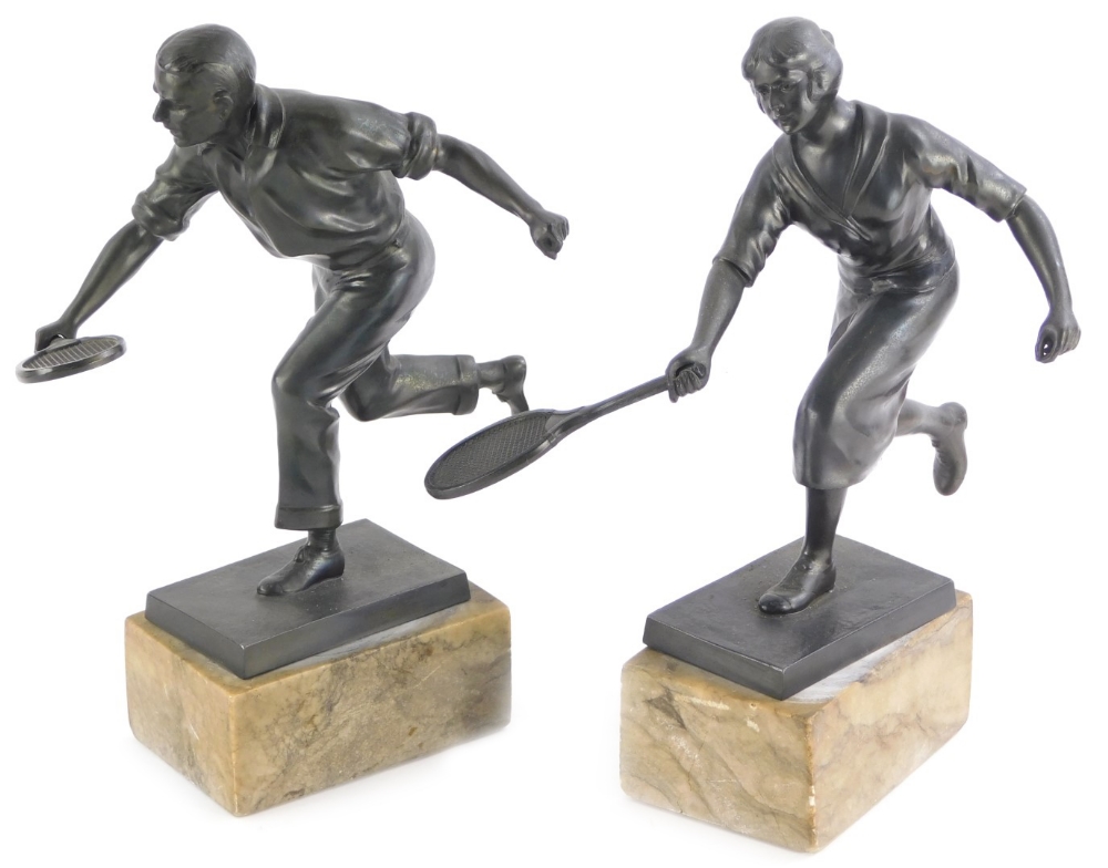 Early 20thC School. Male and female tennis players, bronzed spelter on an marble base, a pair 25cm a