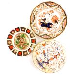 A Royal Crown Derby Imari pattern dish, a 19thC Derby plate, and a similar plate. (3)