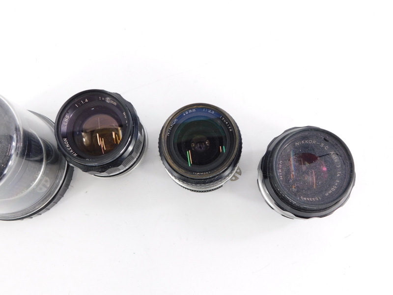 Four camera lenses to fit Nikon cameras, to include a Nikkor 18mm f3.5 super wide angle lens, a Nikk - Image 2 of 2