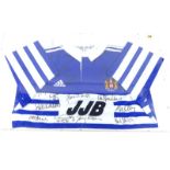 A Wigan Warriors Rugby League team signed shirt, probably for the season 1999-2000, bearing signatur