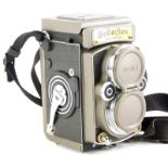 A rare Rolleiflex 2.8GX edition "60 Years of Rolleiflex 1929-1989" camera, the camera with a gold pl