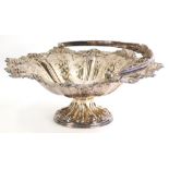 An Edwardian silver plated comport, of shaped form, repousse decorated with berries and scrolls, wit