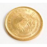 A South African 1/10th of a Krugerrand coin dated 1988.