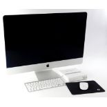 An Apple Mac computer, with 28 inch screen, keyboard, mouse and USB superdrive.