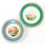 Two early 20thC porcelain plates, decorated with possibly Lake District scenes, lakes before mountai