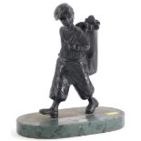 20thC School. Caricature golfer, carrying golf clubs, and wearing plus fours etc., on a green marble