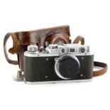 A Leica IIIa camera, serial number 357642, with a Leitz 5cm f3.5 Elmar lens, in a leather case.