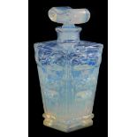 A Sabino opalescent art glass scent bottle and stopper, of tapering form decorated with scrolls, etc
