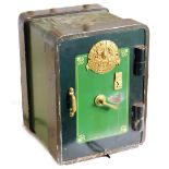 A Milner safe, painted in black and green with decorative plaque, with key, 62cm high, 45cm wide, 46