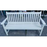 An Alexander Rose cream painted slatted bench.