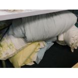 A large quantity of linen, duvets, pillows etc. (a quantity)