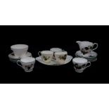 A Shelley porcelain part tea service decorated in the Fuchsia pattern, No 82395, printed and painted