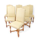 A set of six 20thC oak high back dining chairs, each with serpentine crest rails, deep seats and inv