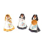 Three Italian 20thC terracotta figures of ladies, designed A Spiga, Assemini., each figure modelled