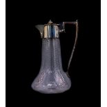 A Victorian cut glass claret jug, possibly Stourbridge, with plated mount and hinged lid, the body w