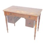 A Victorian mahogany and later kneehole desk, the oblong top raised above a frieze drawer and