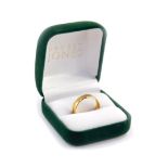 An 18ct gold wedding band, size R, 6.2g.