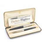 A Parker 61 Flighter fountain pen and propelling pencil set, with guarantee, dated 1969, cased.