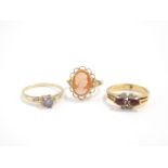 A 9ct gold and cameo ring, size K, and two 9ct gold and gem set rings, sizes P/Q and Q, 6.1g. (3)