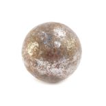An antique iron cannon ball, probably 19thC, 8cm diameter.
