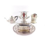 Plated wares, including a twin handled wine bucket of campana form, salver, basket, and a teapot. (a