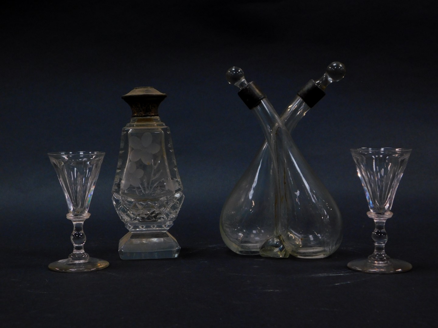 A cut glass conjoined oil and vinegar jar, with silver mounts and glass stoppers, London 1924., a cu