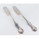 A pair of Victorian entree forks, decorated in the hourglass pattern, crest engraved, John James Wh