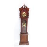 A 20thC mahogany finish grandmother clock, with broken swan neck pediment hood, arch dial, with 15cm