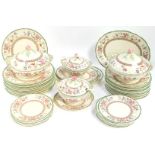 A Royal Cauldon pottery early 20thC dinner service, floral decorated, comprising four graduated meat
