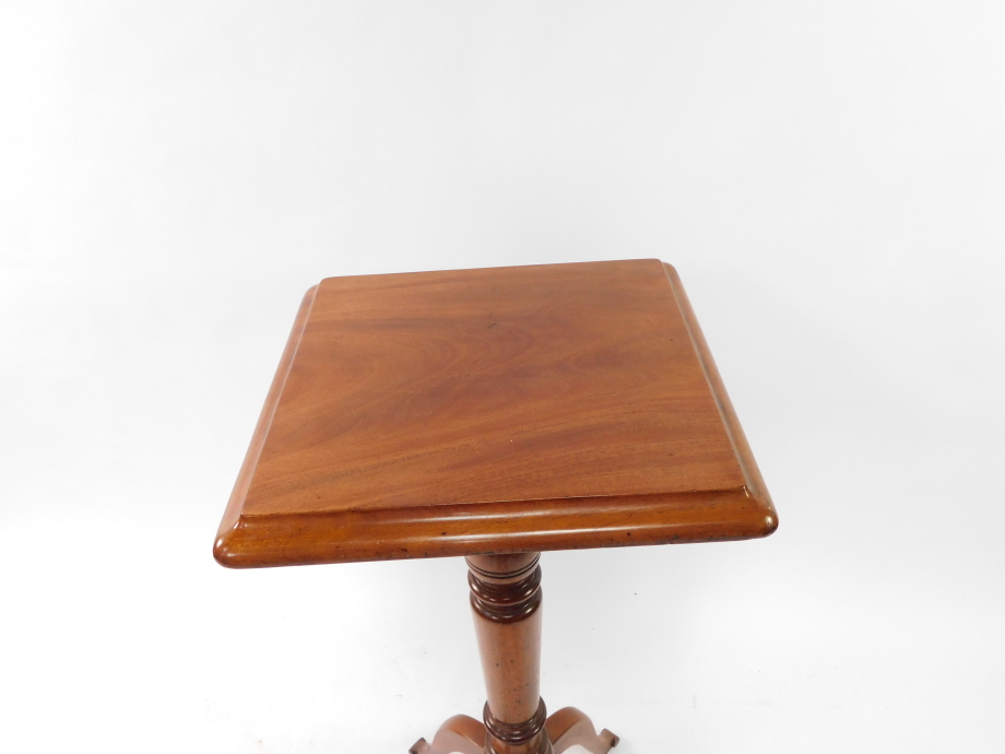 A Victorian mahogany jardiniere stand, with a wide moulded top, raised on a turned stem, terminating - Image 2 of 3