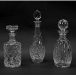 Various 20thC crystal decanters, to include a shouldered circular example with compressed mushroom s