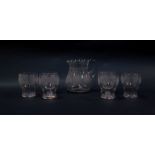 A cut glass water set, engraved with vines, comprising a jug and six glasses. (7)