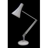 A white anglepoise desk table lamp, model 75, designed by Herbert Terry.