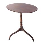 An early 19thC mahogany tripod table, with oval top, raised on a baluster turned column, above thre