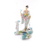 A Franklin Mint porcelain figure modelled as Mariko, Princess of The Wisteria Blooms, designed by Ma